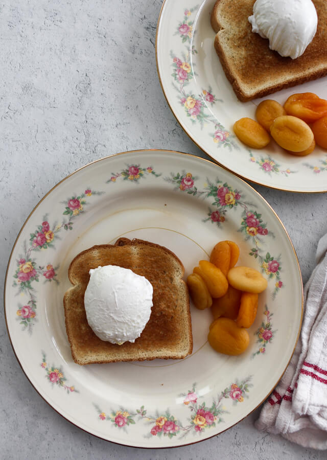 1940s Breakfast with apricots, poached eggs, and toast