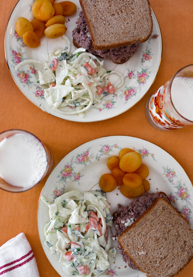 1940s Lunch with Lamb Sandwiches, Cabbage Salad, Apricots, and Milk