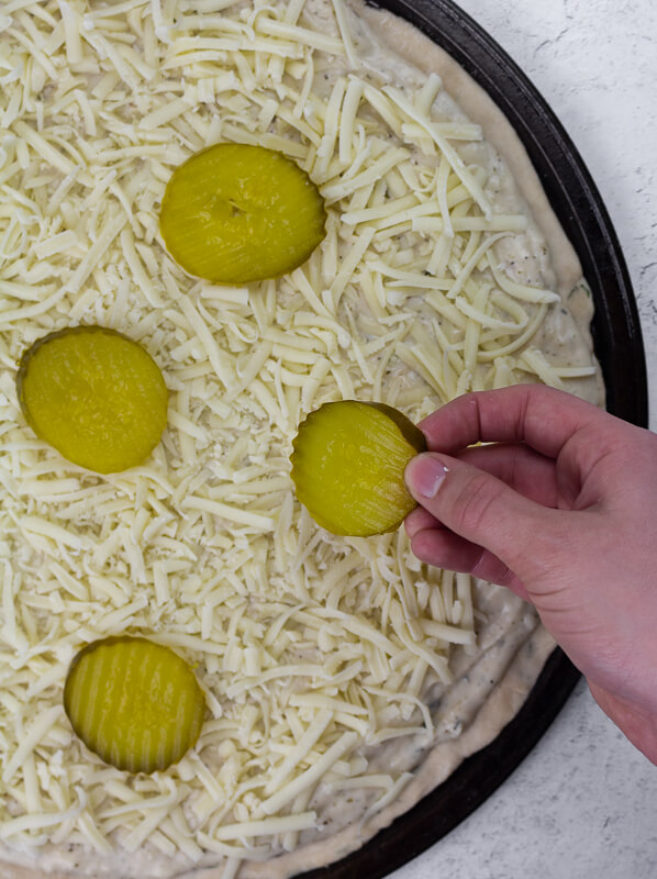 Dill Pickles on top of Pizza